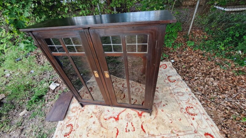 Antique Gustav Stickley Two Door Bookcase with leaded glass.
